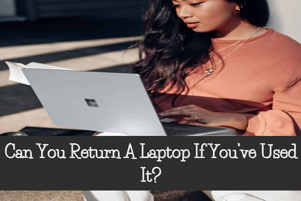 girl sitting with surface laptop on her knee