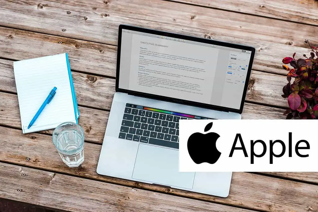 laptop on desk to return to apple
