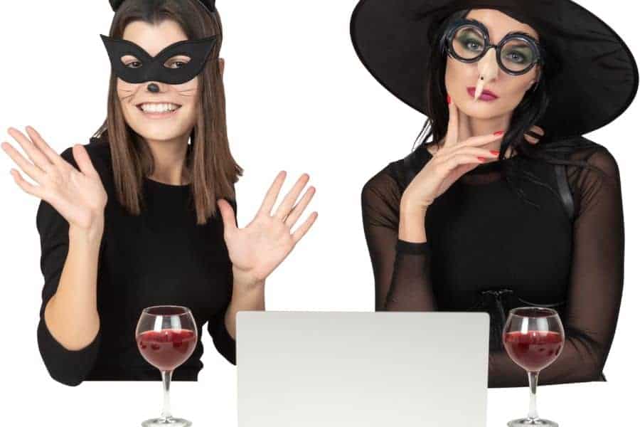 two female college students wearing halloween costumes with glasses