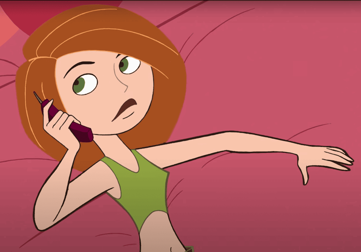 kim possible laying on bed talking on the phone