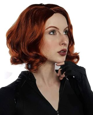 Image of a woman wearing a short, wavy auburn wig styled in a sleek bob, paired with a black zip-up outfit and gloves. This bold and confident look is ideal for **halloween costumes red hair**, perfect for embodying action-hero or spy-inspired characters.