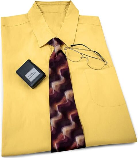 Folded yellow dress shirt paired with a retro wave-patterned tie, metal-frame glasses, and a black pager labeled “Property of Dwight Schrute.” This minimalist costume kit is a clever nod to *The Office* and a fun, low-effort option for Halloween costumes for guys who love sitcom references.