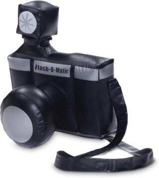 A large inflatable camera prop labeled “Flash-O-Matic” in black and silver with a shoulder strap, designed to resemble a vintage-style camera. Great as a playful accessory for paparazzi or tourist-themed Halloween costumes for guys.