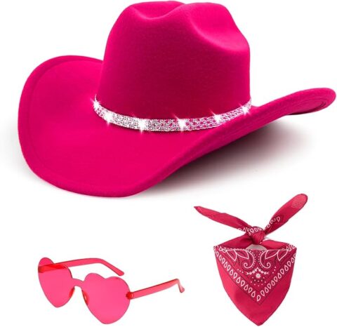 Image of a hot pink cowgirl hat with a sparkling rhinestone band, paired with heart-shaped sunglasses and a red bandana. This vibrant accessory set is perfect for **Barbie Halloween Costumes for Adults**, completing a glamorous cowgirl Barbie look for festive Halloween parties or themed dress-up events.
