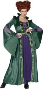 Image of a woman wearing a long green and purple witch-style gown with gold detailing, dramatic flared sleeves, and voluminous curly red hair. This enchanting and theatrical outfit is perfect for **halloween costumes red hair**, ideal for embodying a classic witch or magical movie-inspired character.